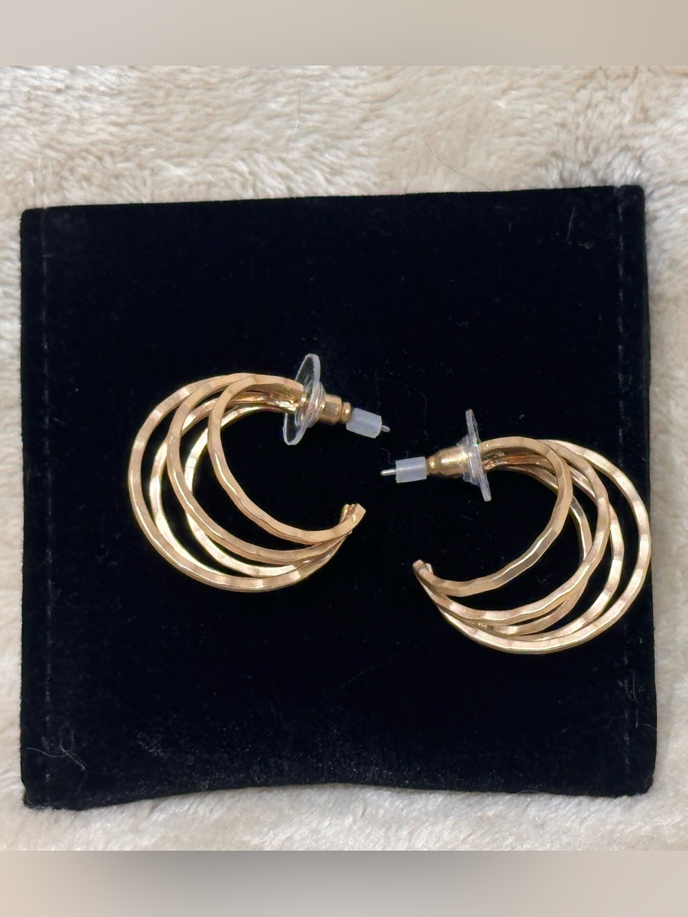 Gold tone earrings by Lolo’s Jewelry